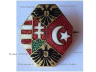 Austria Hungary WW1 Cap Badge with the Central Powers Flags and the Imperial Eagles Official Type by the Office for War Supplies